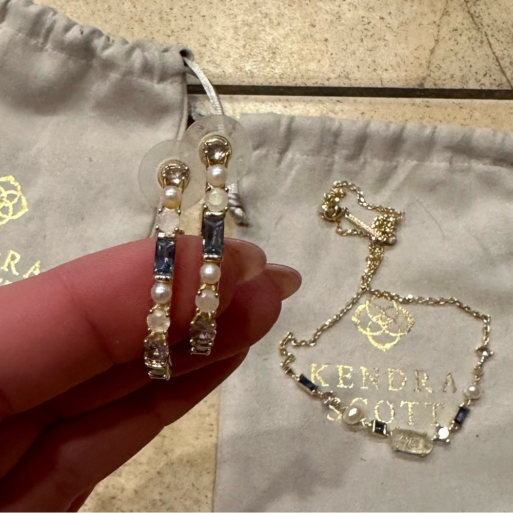 Set of Kendra Scott Madelyn hoop earrings and pendant necklace